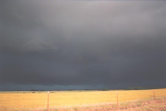 cumulonimbus thunderstorm_base : SW of Elk City along route 283 Oklahoma, USA   19 May 2001